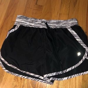 Black and white running shorts